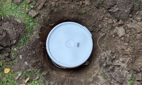 Why You Should Bury a 5-Gallon Bucket in Your Backyard